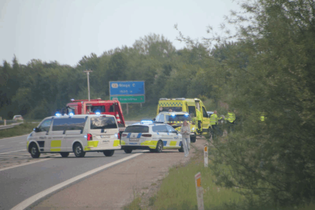 Motorcykeluheld på motorvejen