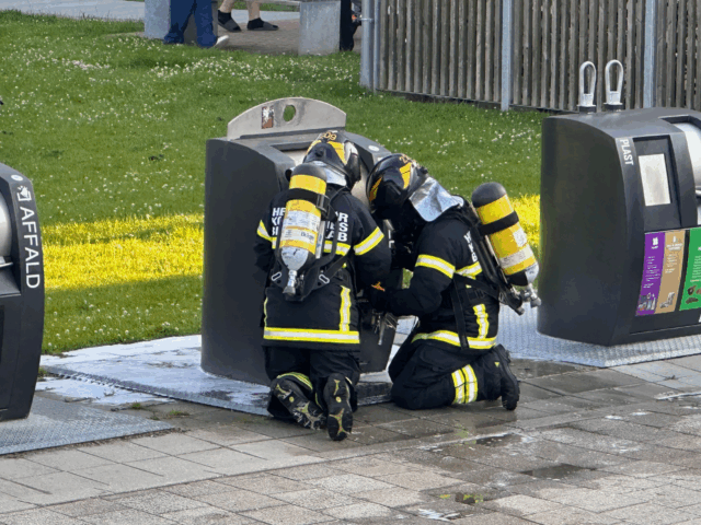 Melding om brand i en nedgravet affaldscontainer