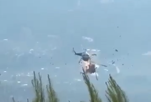 Dansker omkom i voldsom helikopterulykke: Tragiske billeder viser styrtet i flammer